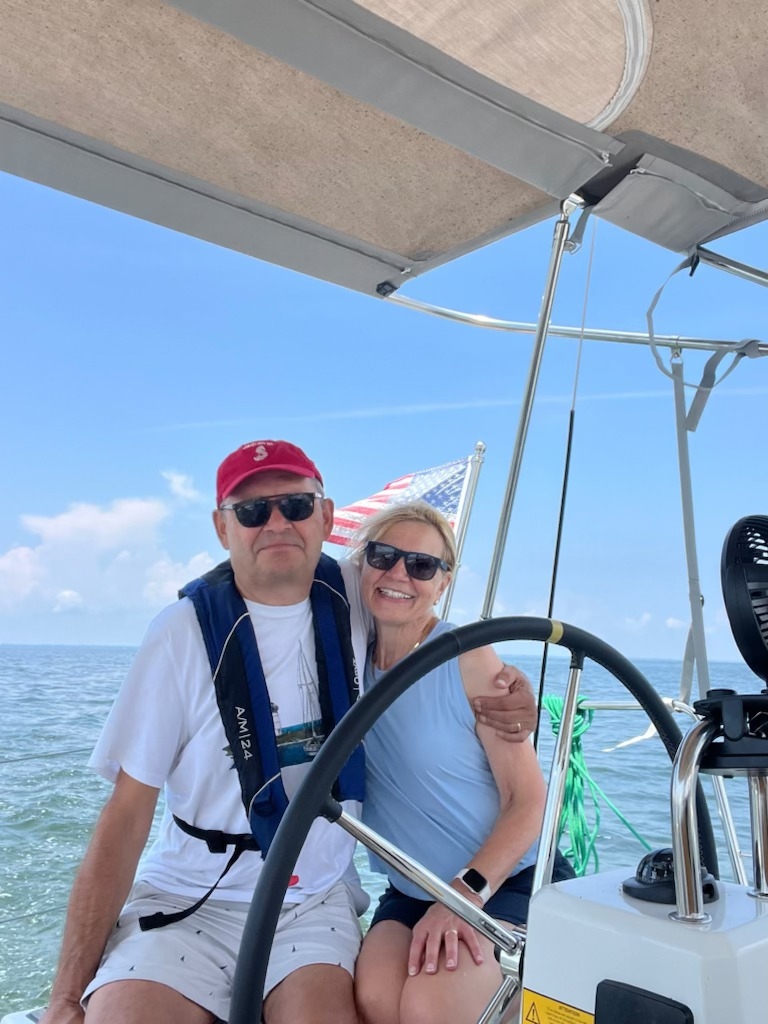 Crew at the helm on the Chesapeake Bay