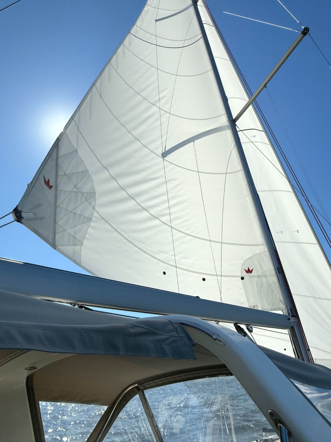 Sails full in sunlight